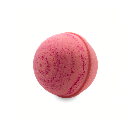 Pink bath bomb on a white background